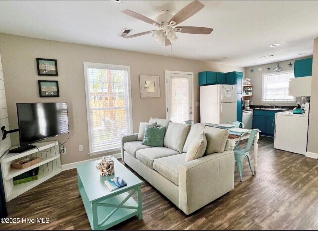 Photo of 114 NE 50th Street, Oak Island, NC 28465 (MLS # 100537146)