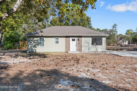 Photo of 1061 Bayside Lane, Southport, NC 28461 (MLS # 100491333)
