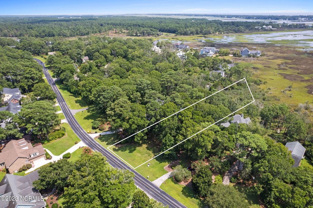 Photo of 3229 Beaver Creek Drive SE, Southport, NC 28461 (MLS # 100396863)