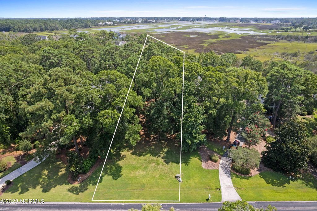 Photo of 3229 Beaver Creek Drive SE, Southport, NC 28461 (MLS # 100396863)
