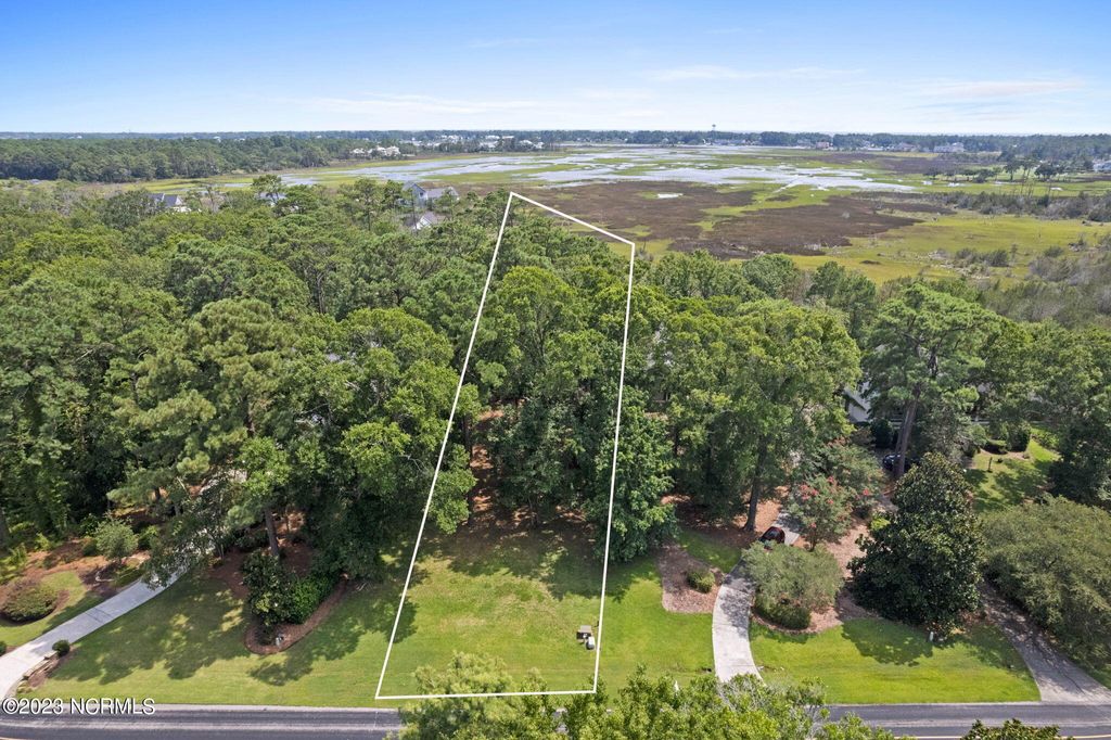 Photo of 3229 Beaver Creek Drive SE, Southport, NC 28461 (MLS # 100396863)
