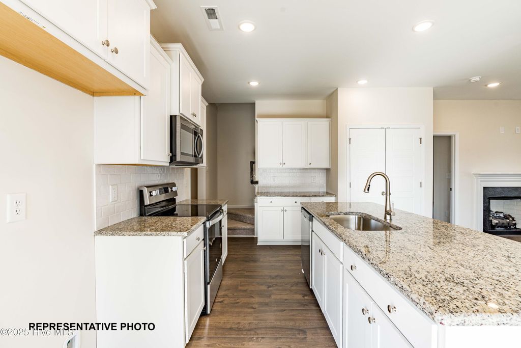 Photo of 633 Springtooth Drive, Zebulon, NC 27597 (MLS # 100527609)