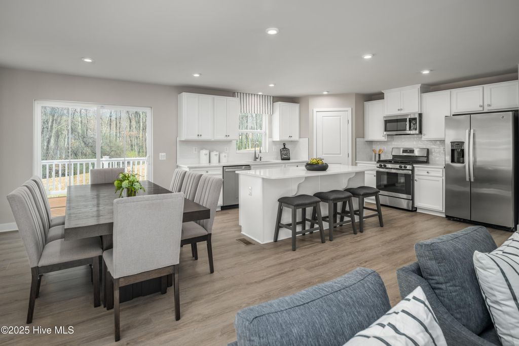 Photo of 4077 Farmfield Drive, Navassa, NC 28451 (MLS # 100534966)