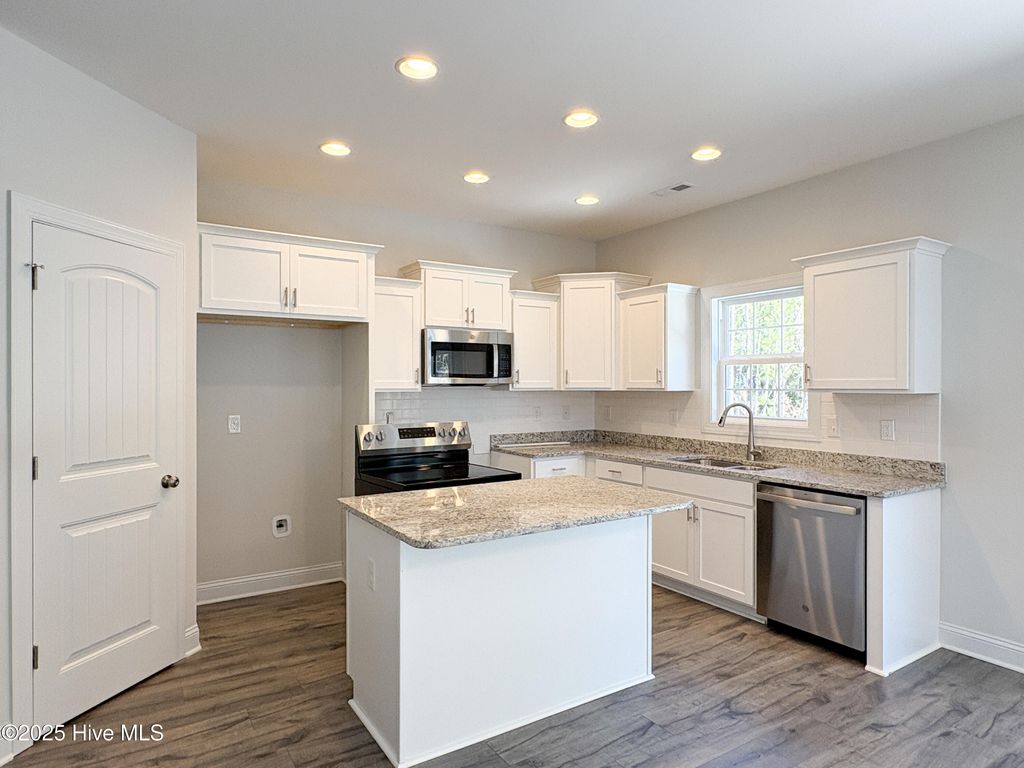Photo of 718 Ellabond Street, Sneads Ferry, NC 28460 (MLS # 100499951)