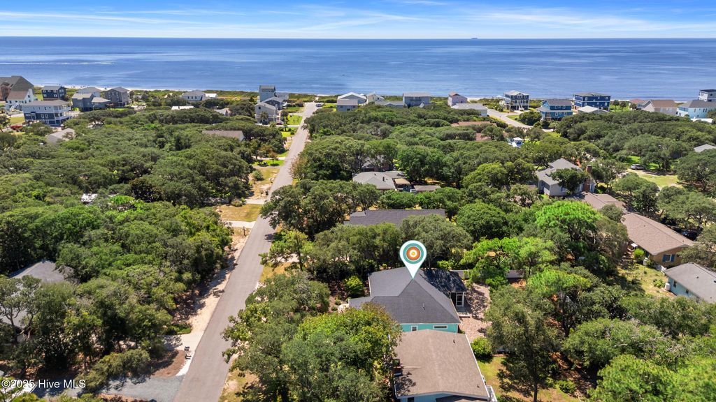 Photo of 217 Sellers Street, Oak Island, NC 28465 (MLS # 100527860)