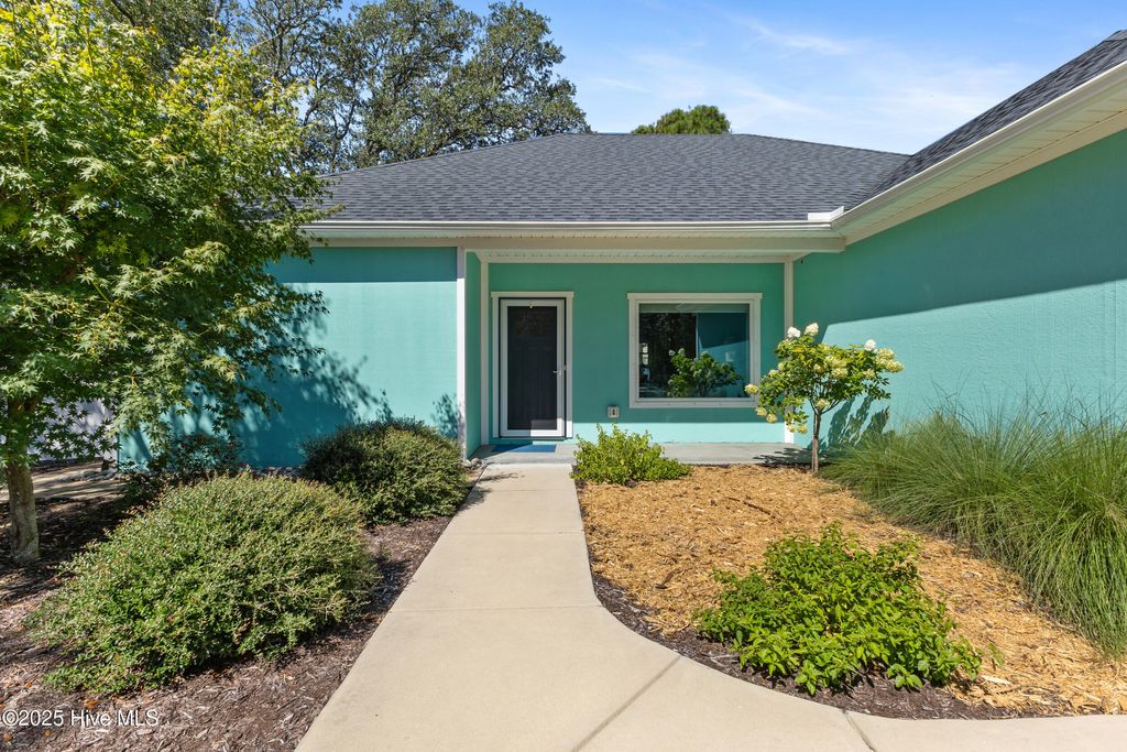 Photo of 217 Sellers Street, Oak Island, NC 28465 (MLS # 100527860)