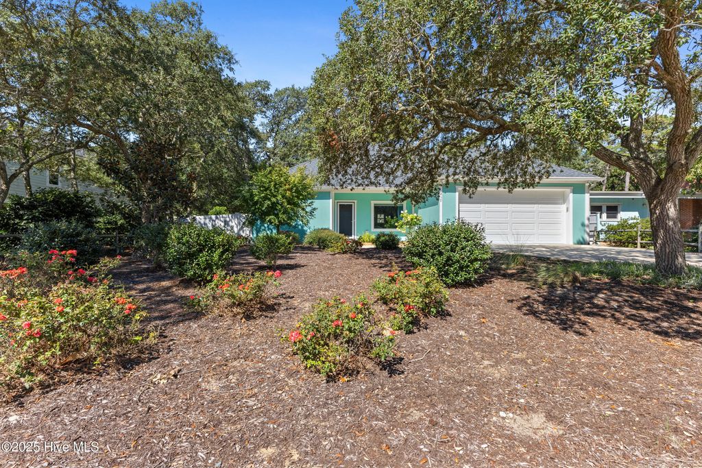 Photo of 217 Sellers Street, Oak Island, NC 28465 (MLS # 100527860)