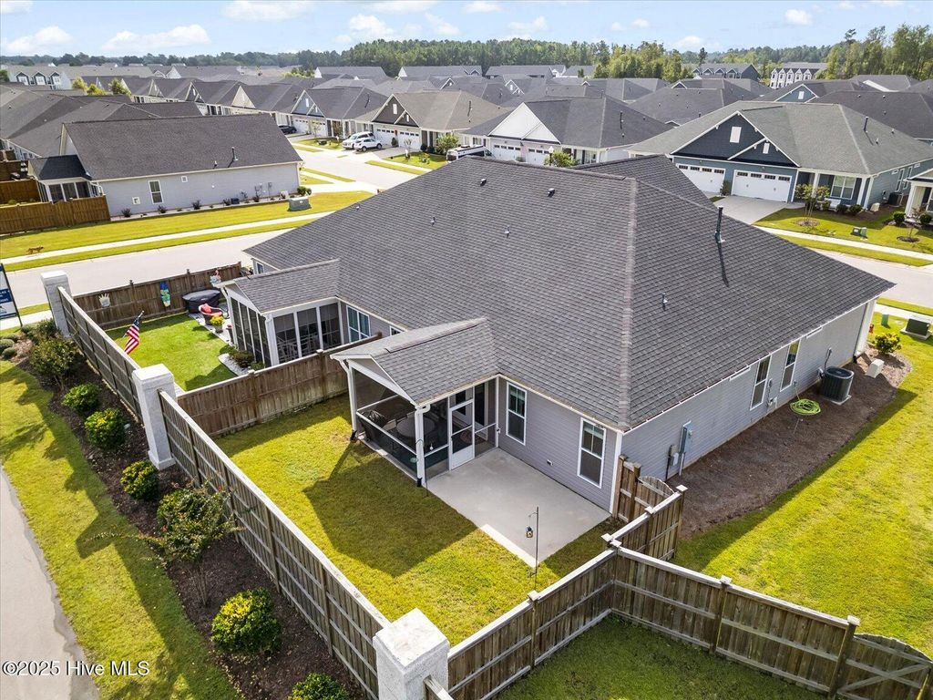 Photo of 6488 Pinnacle Point, Winnabow, NC 28479 (MLS # 100534036)