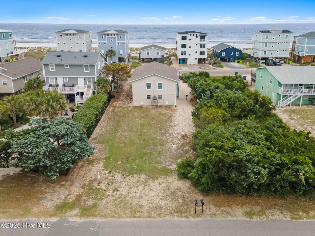 Photo of 926 E Beach Drive, Oak Island, NC 28465 (MLS # 100510306)