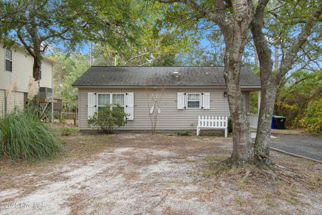 Photo of 148 NW 5th Street, Oak Island, NC 28465 (MLS # 100532715)