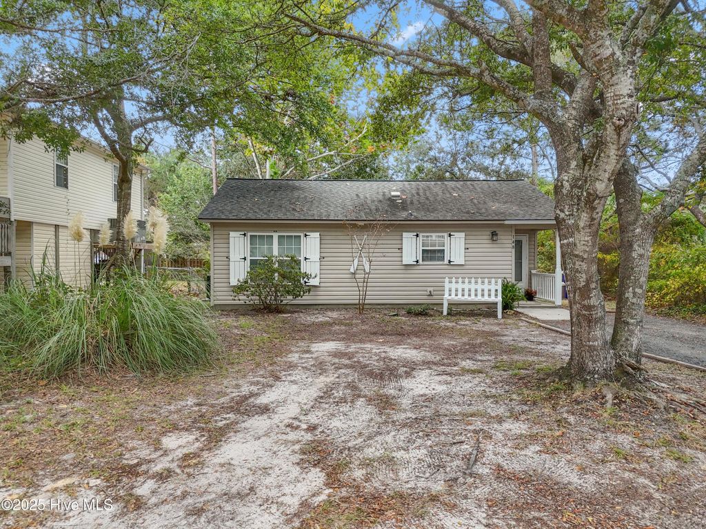 Photo of 148 NW 5th Street, Oak Island, NC 28465 (MLS # 100532715)
