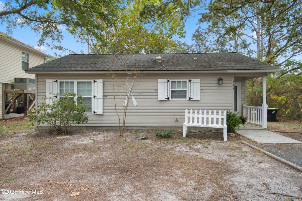 Photo of 148 NW 5th Street, Oak Island, NC 28465 (MLS # 100532715)