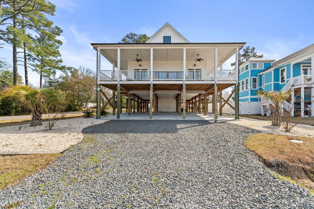 Photo of 1507 E Yacht Drive, Oak Island, NC 28465 (MLS # 100496086)