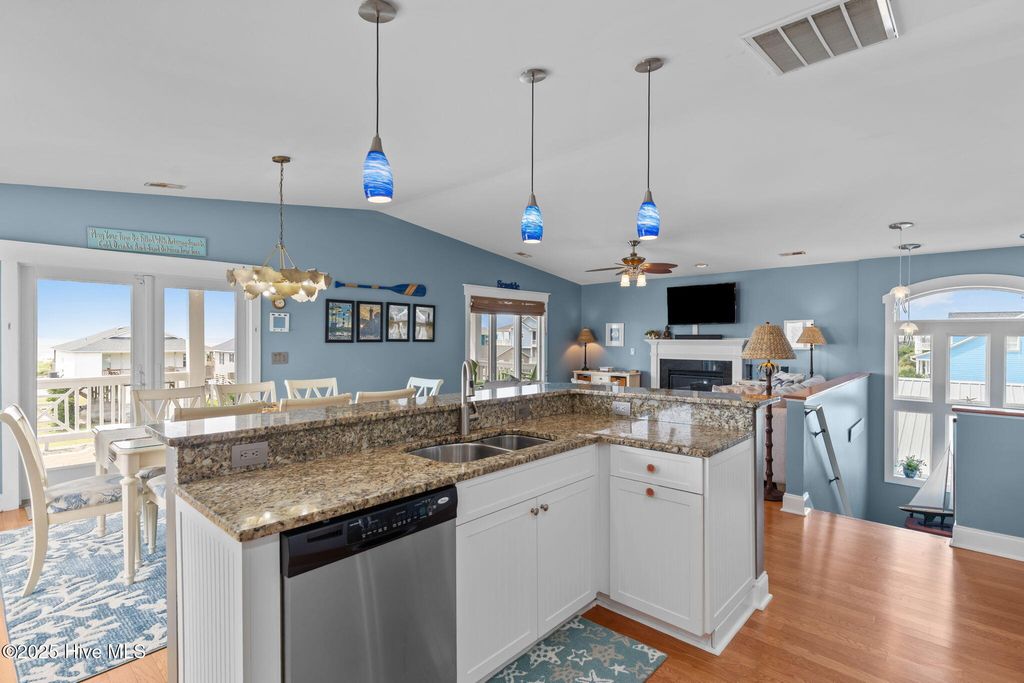 Photo of 1404 E Dolphin Drive, Oak Island, NC 28465 (MLS # 100526525)