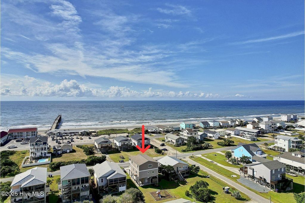 Photo of 1404 E Dolphin Drive, Oak Island, NC 28465 (MLS # 100526525)
