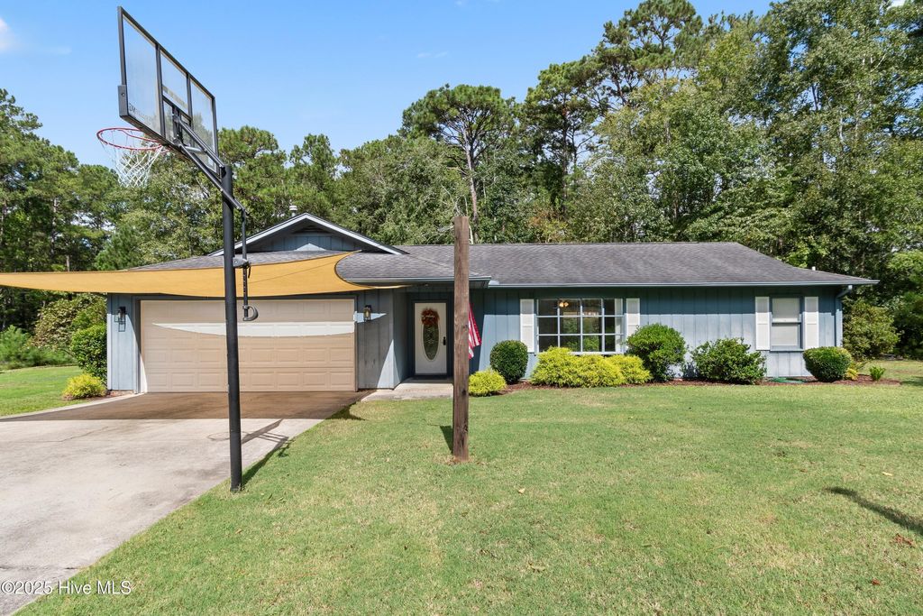 Photo of 580 Boundaryline Drive NW, Calabash, NC 28467 (MLS # 100533760)