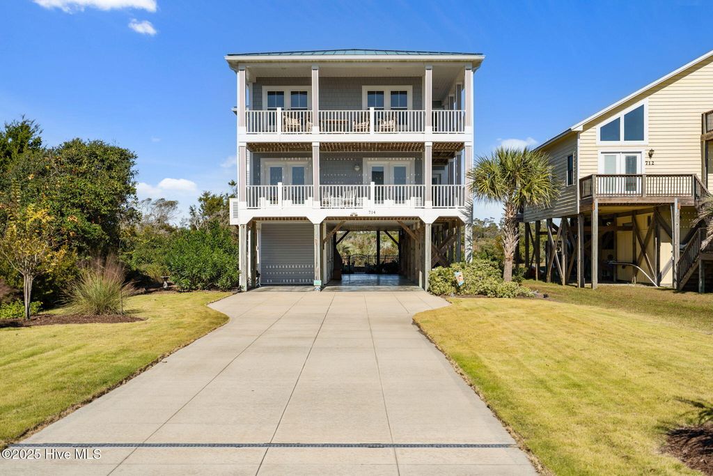 Photo of 714 W Dolphin Drive, Oak Island, NC 28465 (MLS # 100543391)