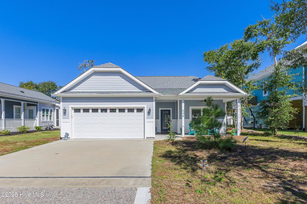 Photo of 504 W Oak Island Drive, Oak Island, NC 28465 (MLS # 100523610)