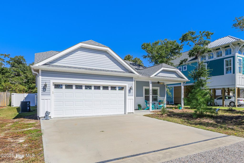 Photo of 504 W Oak Island Drive, Oak Island, NC 28465 (MLS # 100523610)