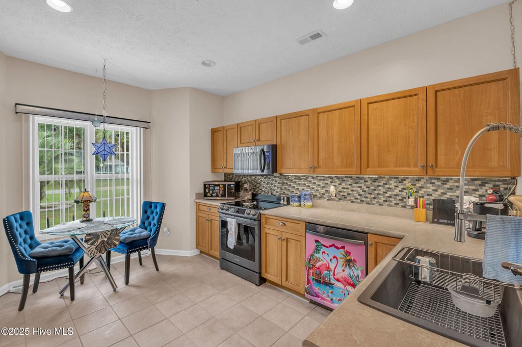 Photo of 9372 Lyn Marie Drive NE, Leland, NC 28451 (MLS # 100527690)