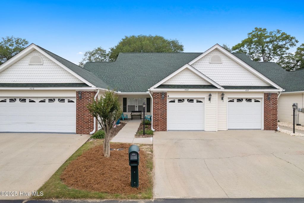 Photo of 404 Sunset Oaks Lane, Sunset Beach, NC 28468 (MLS # 100505691)