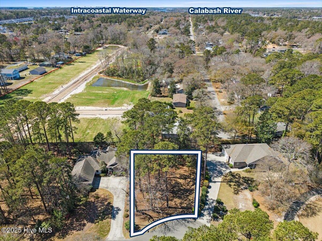 Photo of 97535 Oyster Pointe Drive, Sunset Beach, NC 28468 (MLS # 100495339)