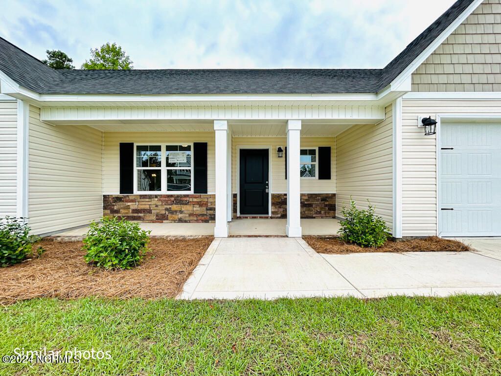 Photo of 134 Tides End Drive, Holly Ridge, NC 28445 (MLS # 100510653)