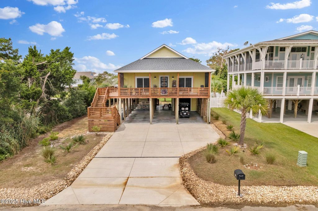 Photo of 115 SE 45th Street, Oak Island, NC 28465 (MLS # 100526882)