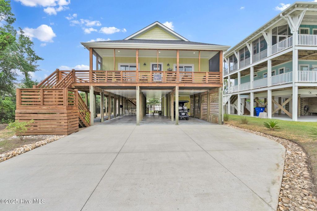 Photo of 115 SE 45th Street, Oak Island, NC 28465 (MLS # 100526882)