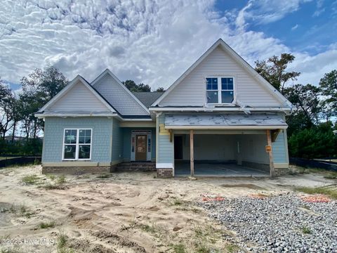 Photo of 3316 Island Lakes Drive, Oak Island, NC 28461 (MLS # 100526979)