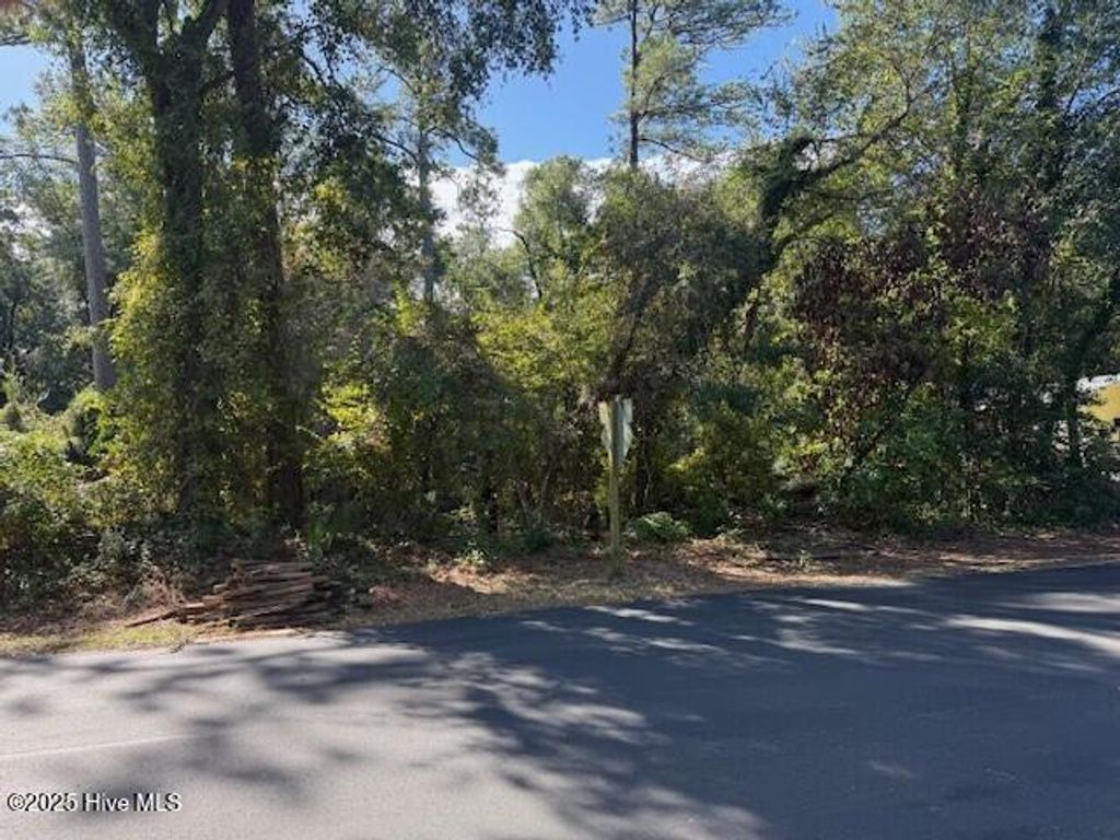 Photo of 7409 Sound Drive, Emerald Isle, NC 28594 (MLS # 100535754)