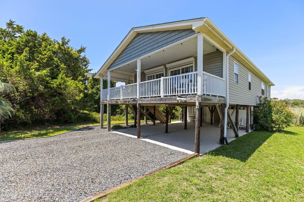 Photo of 316 E Dolphin Drive, Oak Island, NC 28465 (MLS # 100513587)