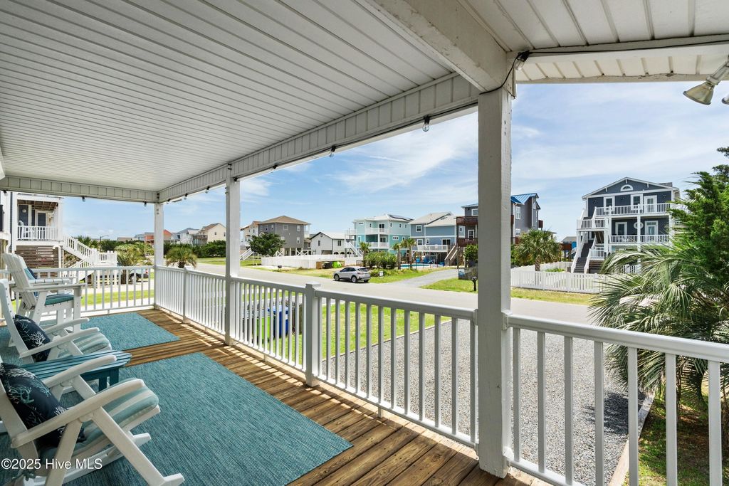 Photo of 316 E Dolphin Drive, Oak Island, NC 28465 (MLS # 100513587)