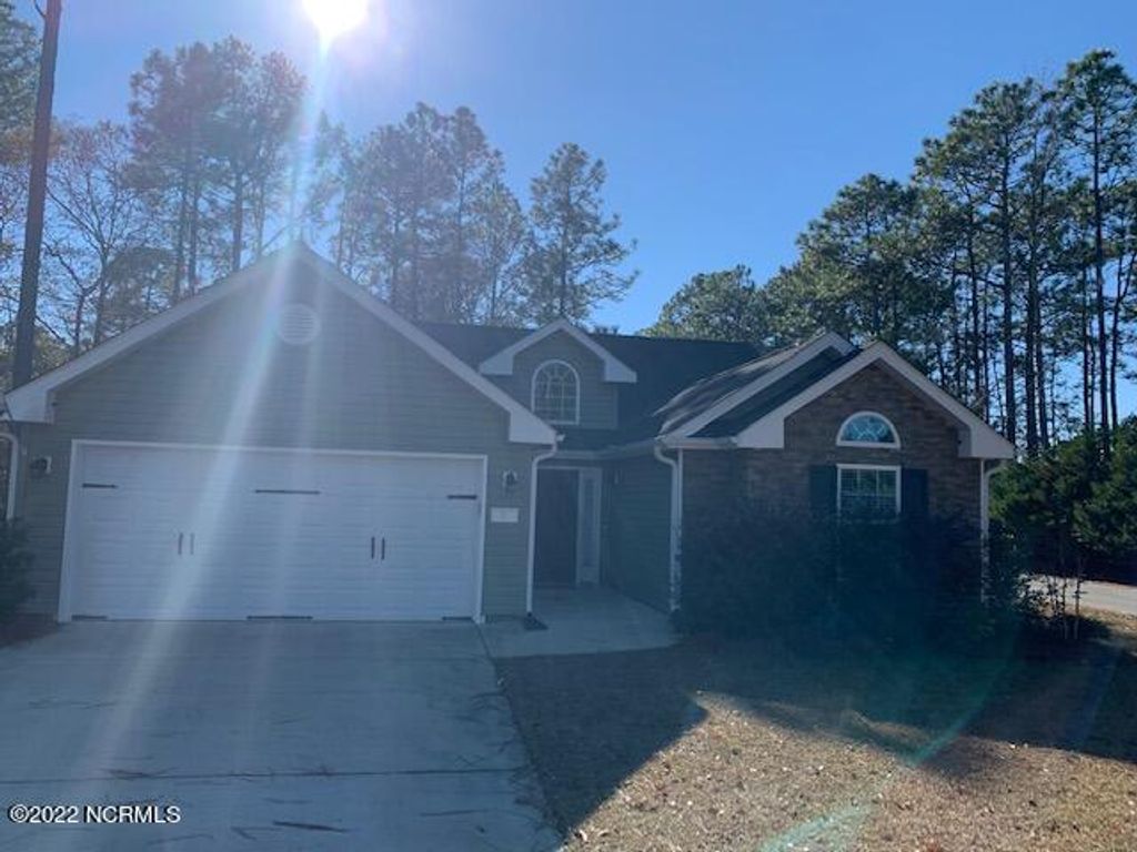 Photo of 15 Court 11 Northwest Drive, Carolina Shores, NC 28467 (MLS # 100519232)