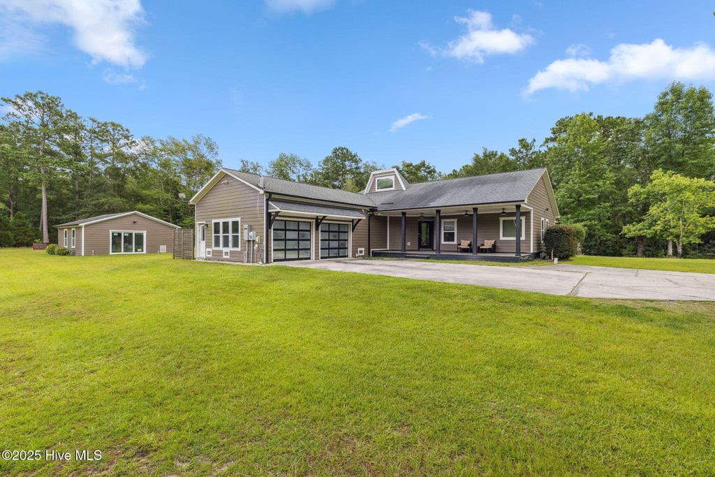 Photo of 7054 Healy Haven Lane NE, Leland, NC 28451 (MLS # 100520398)