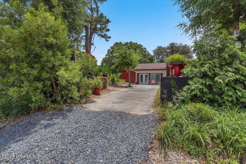 Photo of 4407 E Oak Island Drive, Oak Island, NC 28465 (MLS # 100520356)