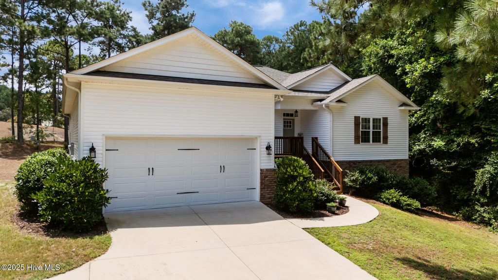 Photo of 27 Pine Lake Drive, Whispering Pines, NC 28327 (MLS # 100522687)