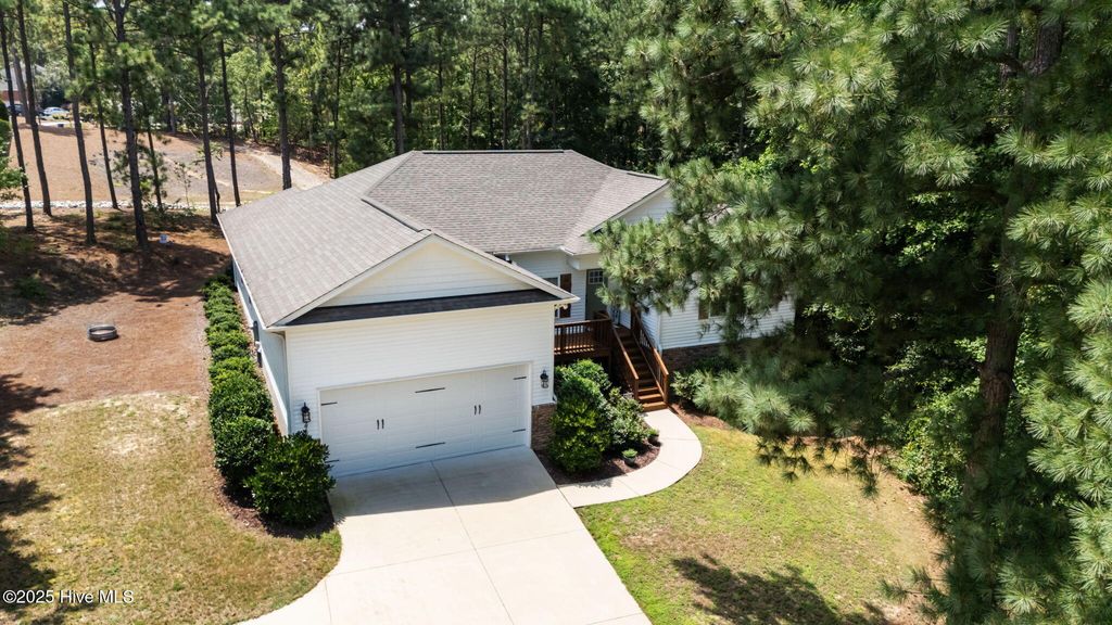 Photo of 27 Pine Lake Drive, Whispering Pines, NC 28327 (MLS # 100522687)