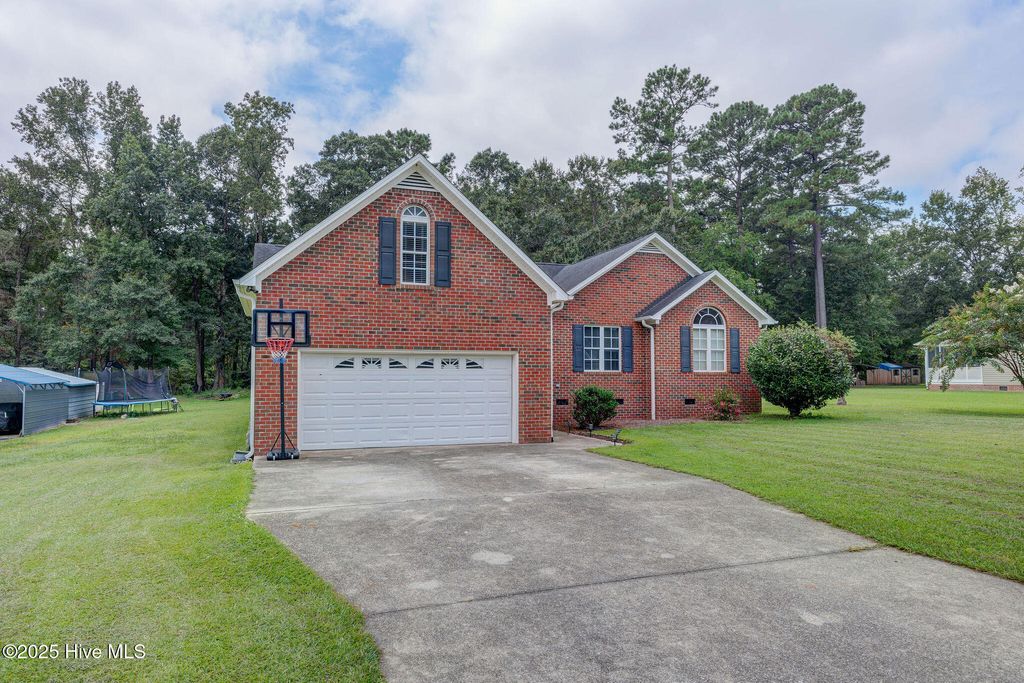 Photo of 609 Lake Side Drive, Riegelwood, NC 28456 (MLS # 100527809)