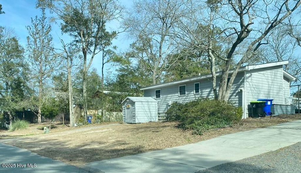 Photo of 7908 E Yacht Drive, Oak Island, NC 28465 (MLS # 100538347)