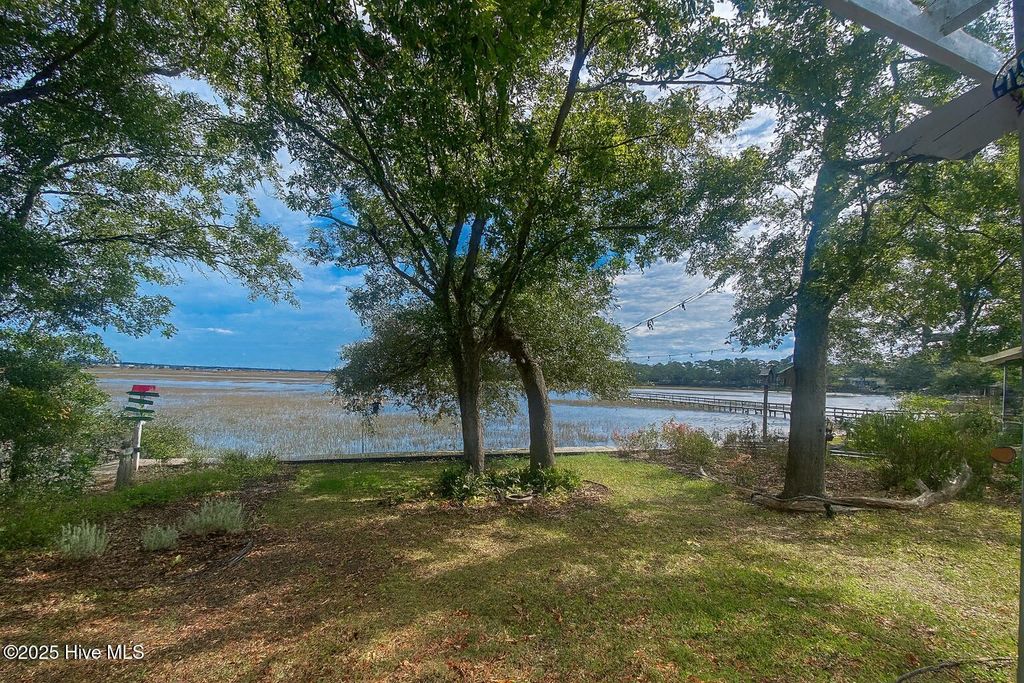 Photo of 7908 E Yacht Drive, Oak Island, NC 28465 (MLS # 100538347)