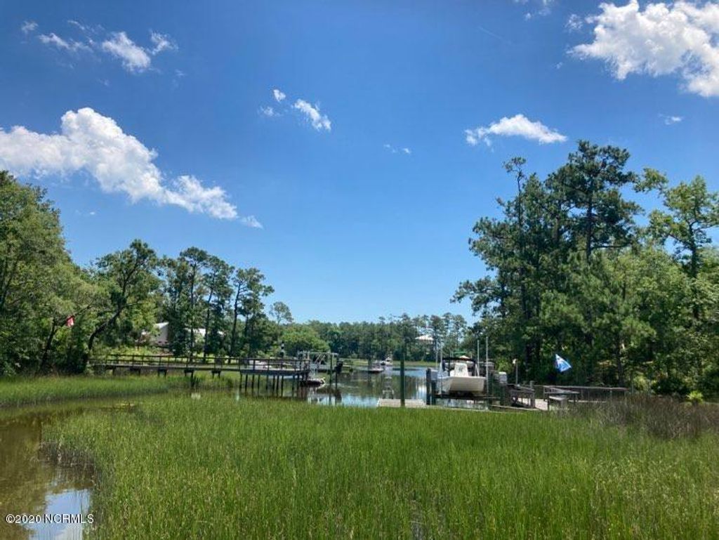 Photo of 76 Hughes Road, Hampstead, NC 28443 (MLS # 100487390)