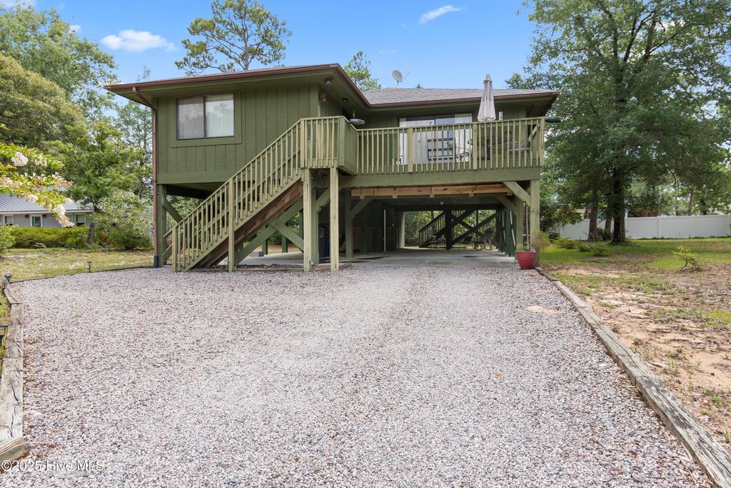 Photo of 118 NW 21st Street, Oak Island, NC 28465 (MLS # 100519095)