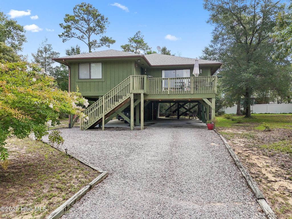 Photo of 118 NW 21st Street, Oak Island, NC 28465 (MLS # 100519095)