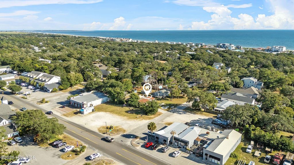 Photo of 314 Keziah Street, Oak Island, NC 28465 (MLS # 100533969)