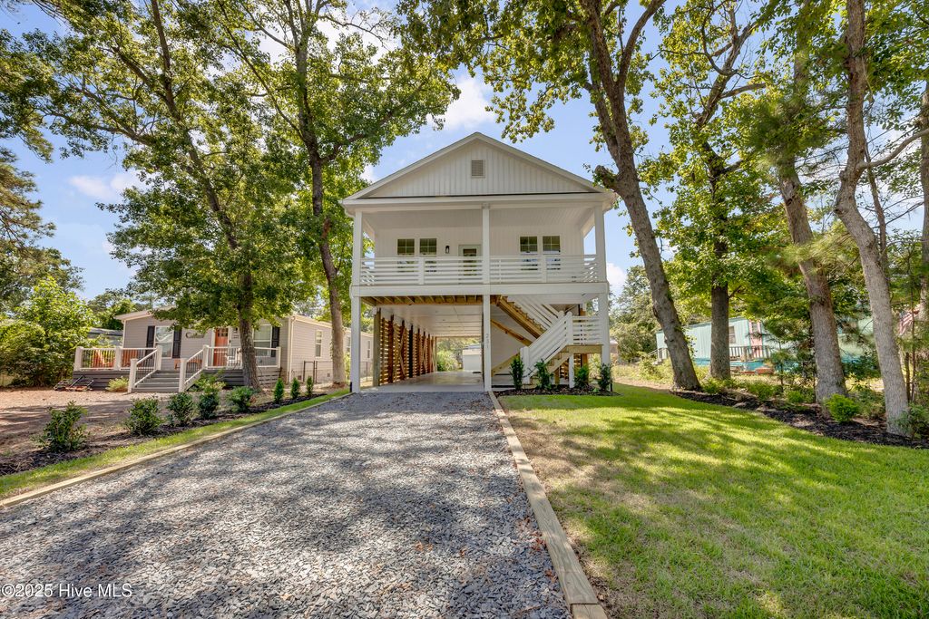 Photo of 231 NE 77th Street, Oak Island, NC 28465 (MLS # 100509344)