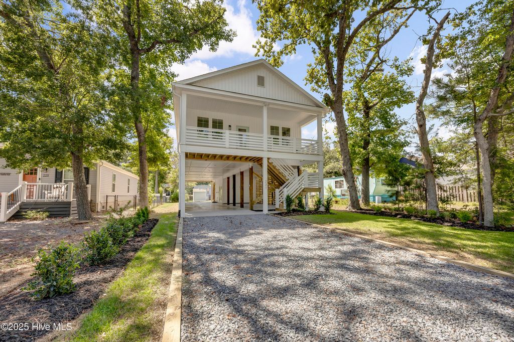 Photo of 231 NE 77th Street, Oak Island, NC 28465 (MLS # 100509344)