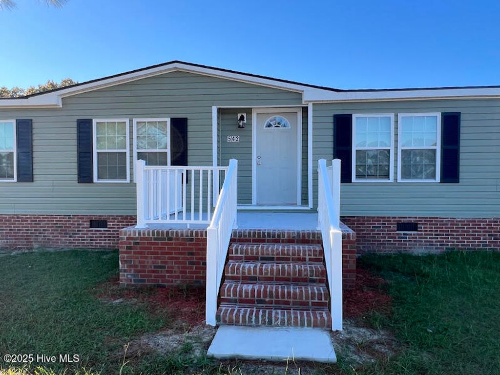 Photo of 542 Red Oak Farm Road, Tar Heel, NC 28392 (MLS # 100543225)