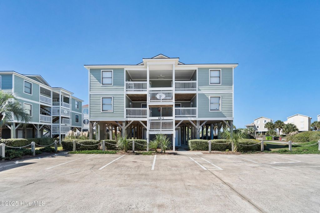 Photo of 49 Ocean Isle West Boulevard # 1-3, Ocean Isle Beach, NC 28469 (MLS # 100534527)