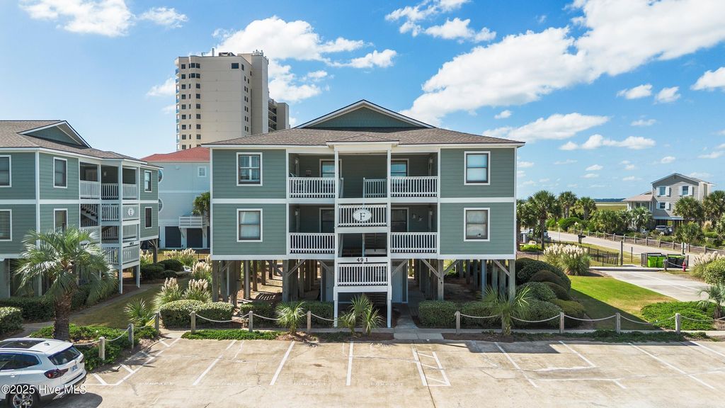 Photo of 49 Ocean Isle West Boulevard # 1-3, Ocean Isle Beach, NC 28469 (MLS # 100534527)